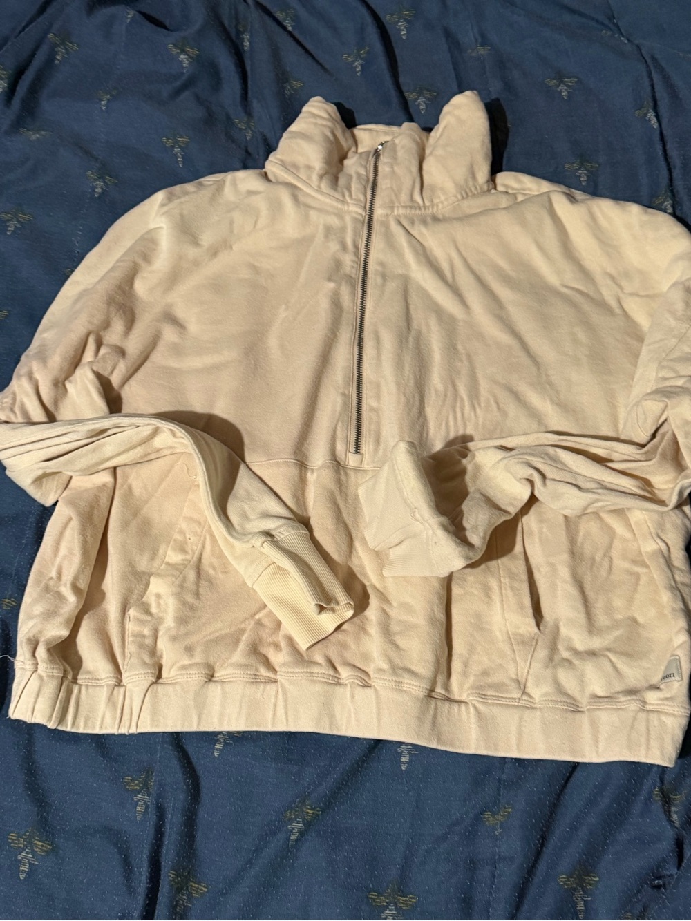 Light Cream Vuori women’s Half-Zip mock neck Pullover